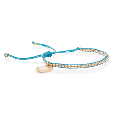 Pulsera Gold Power. Color Aguamarina